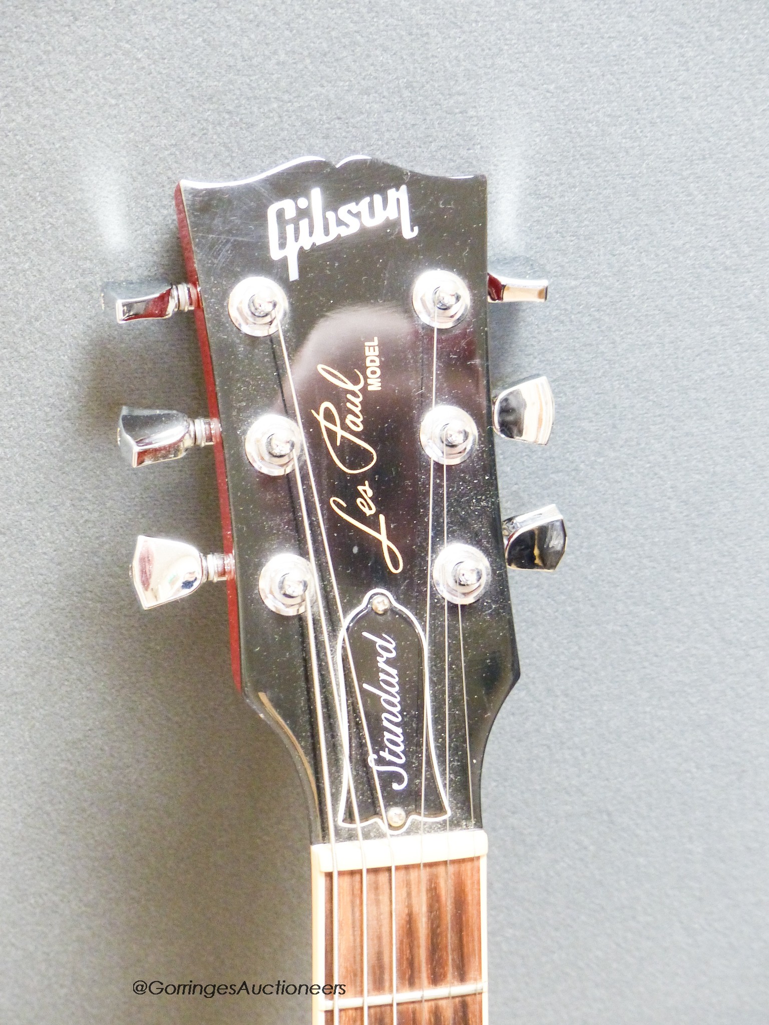A Gibson Les Paul Standard High Performance electric guitar, serial number 130007345, c.2018, cherry sunburst with Gibson hard case and stand